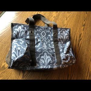 Thirty One Utility Organizer Bag. 5 side pockets . With large zipper inside.